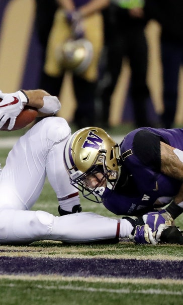 Washington holds off Stanford’s late rally, wins 27-23